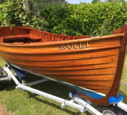 varnished clinker rowing boat